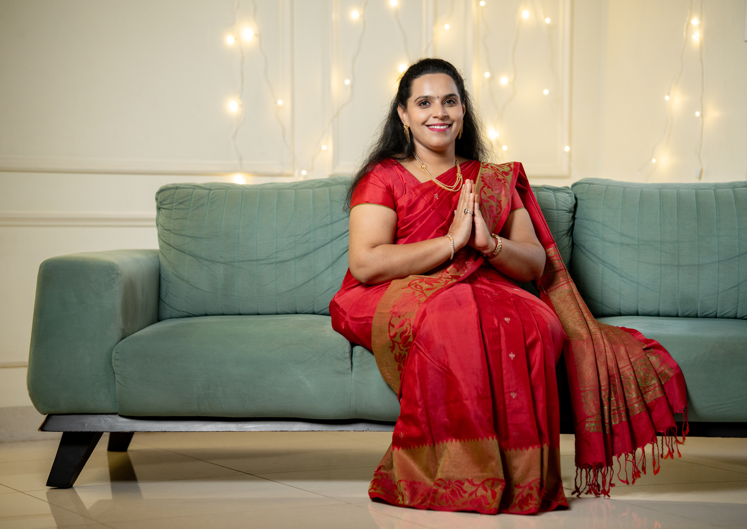 Shilpa Ranjeet Dugar — Vastu consultant welcoming clients with a namaste gesture